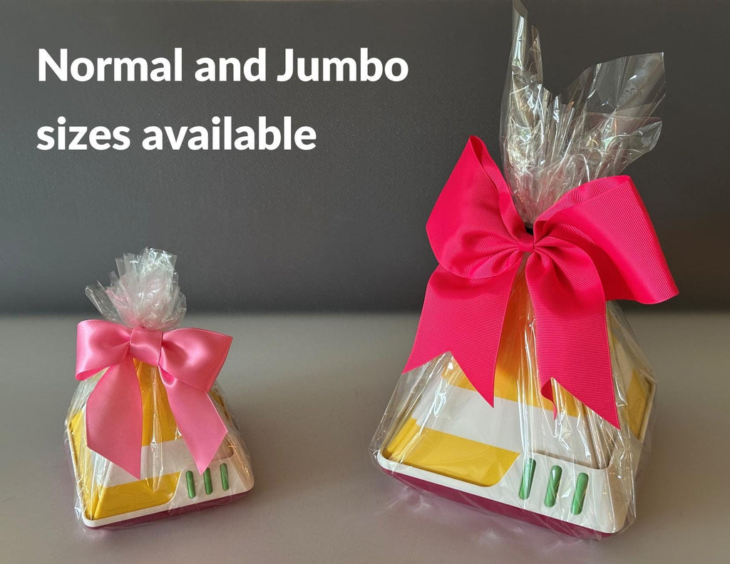 Two gift bags with pink bows, one normal and one jumbo, on a neutral background.