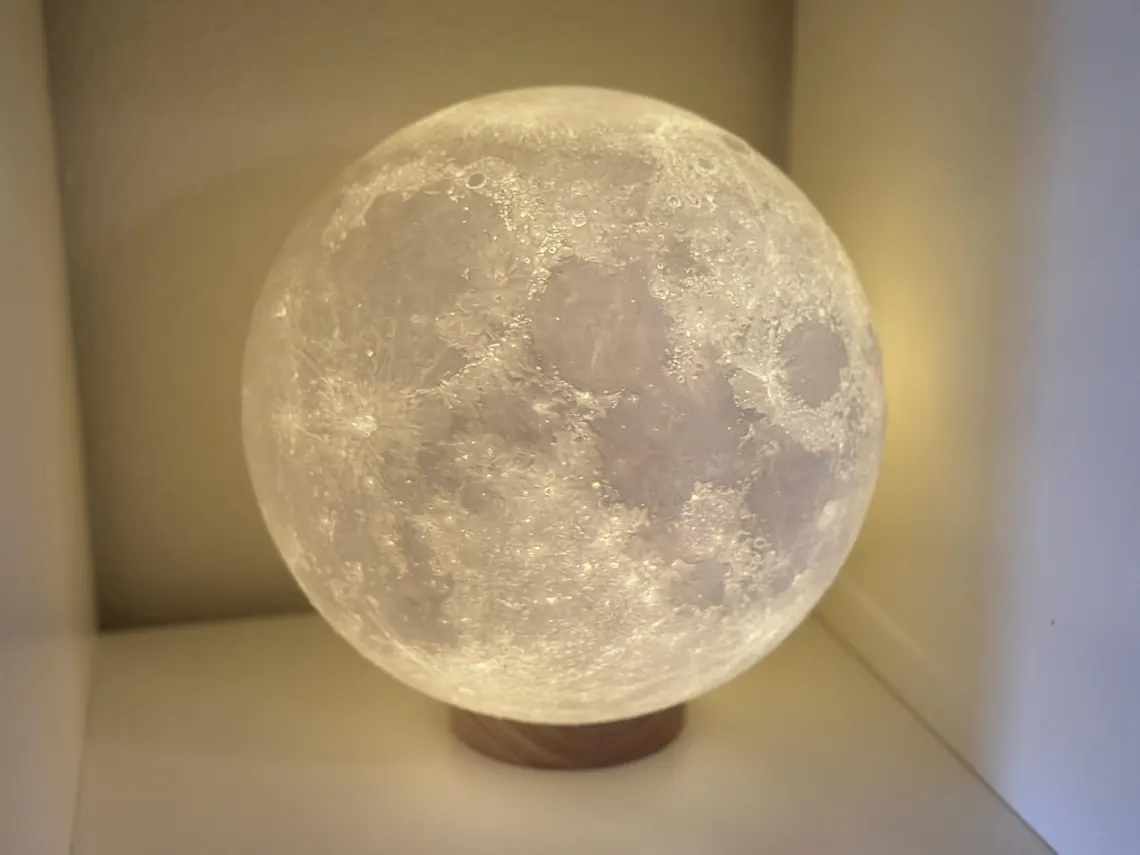 10 inch XL moon lamp, lit, showing the textured lunar surface